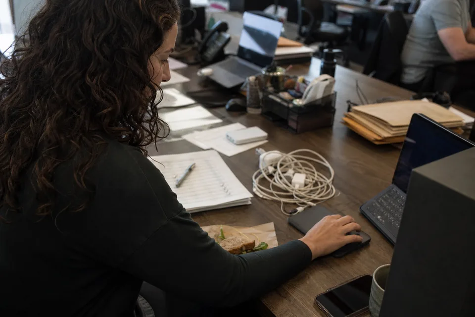 Billing operations lead connecting a billing account on a laptop